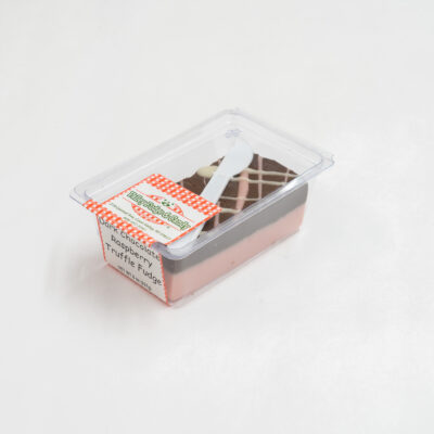 Dark Chocolate Raspberry Truffle Fudge in 1/2 lb. packaging.