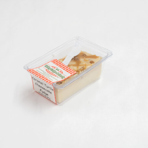 Caramel Turtle Cheesecake Fudge in 1/2 lb. packaging.